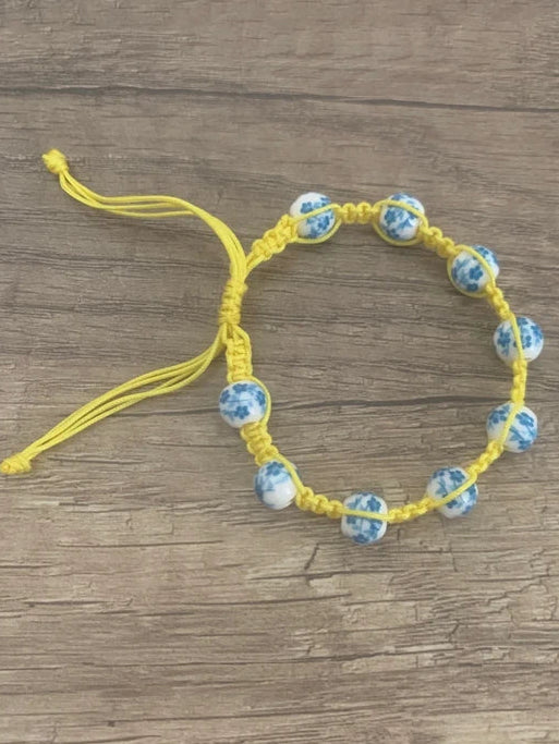Bracelet Shambala ajustable jaune et turquoise en perles de porcelaine