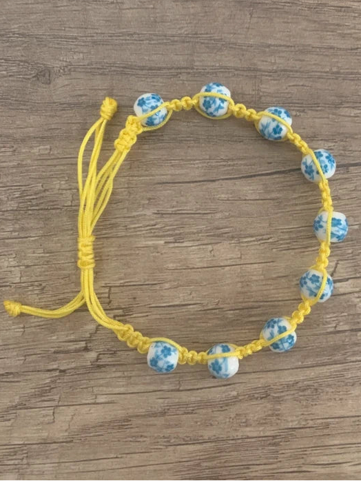 Bracelet Shambala ajustable jaune et turquoise en perles de porcelaine