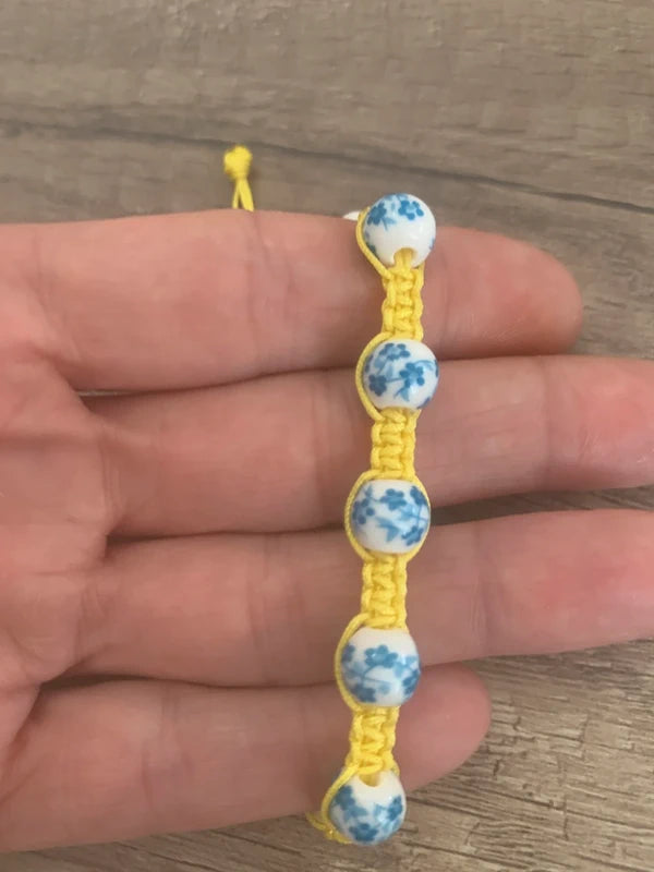 Bracelet Shambala ajustable jaune et turquoise en perles de porcelaine