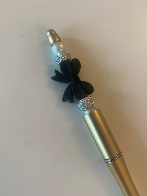 Stylo fantaisie doré gros noeud noir strass accessoire papeterie artisanal