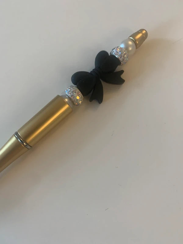 Stylo fantaisie doré gros noeud noir strass accessoire papeterie artisanal