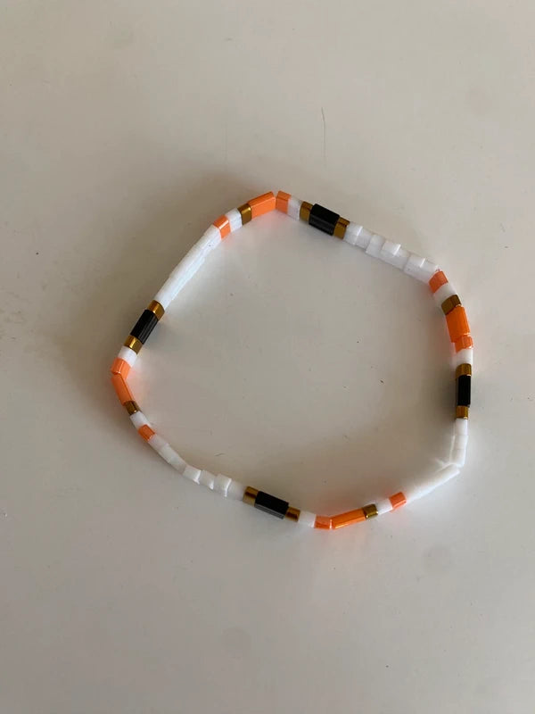 Bracelet fin grande taille élastique half tila blanc noir orange été asymétrique artisanale
