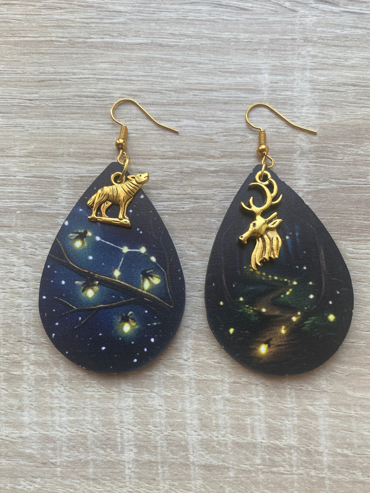 Boucles d’oreilles lucioles phosphorescentes animaux loup et cerf asymétriques