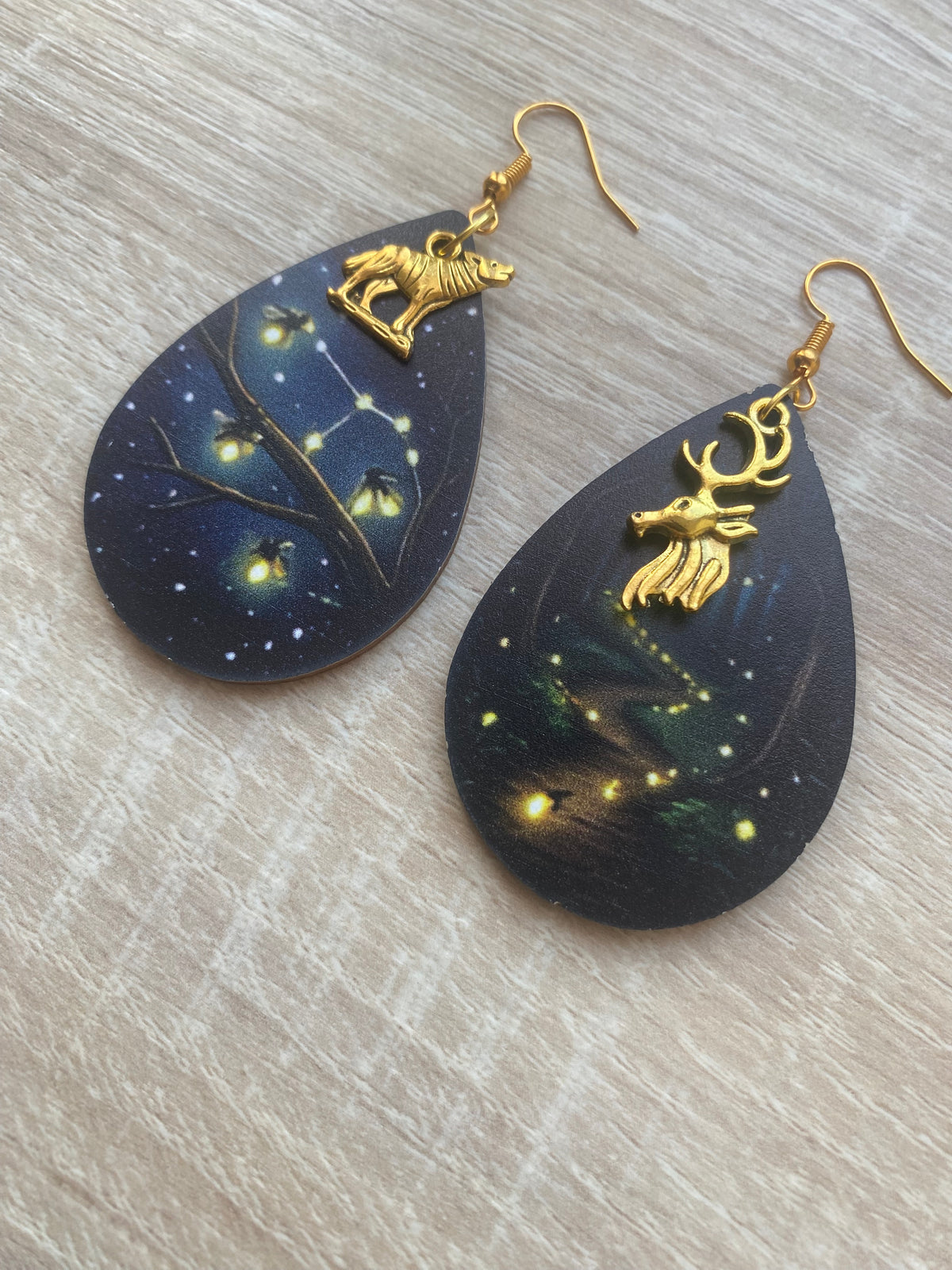 Boucles d’oreilles lucioles phosphorescentes animaux loup et cerf asymétriques