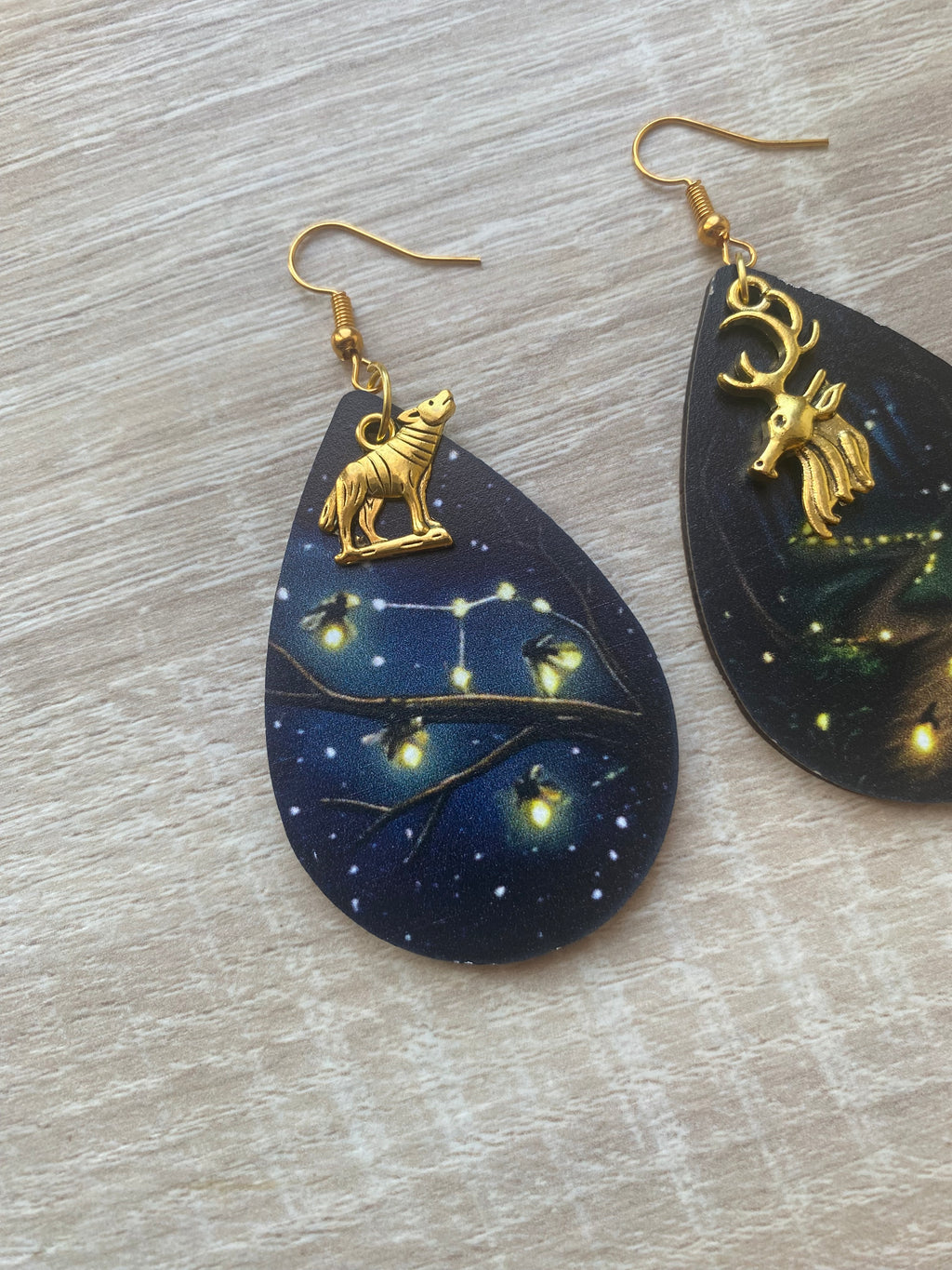 Boucles d’oreilles lucioles phosphorescentes animaux loup et cerf asymétriques