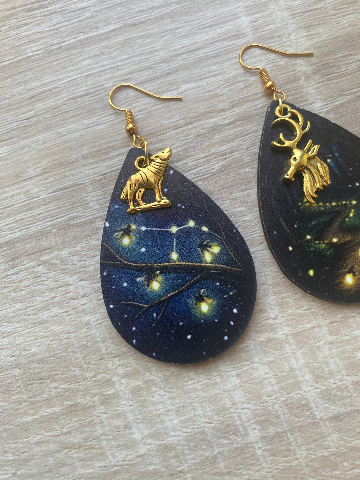 Boucles d’oreilles lucioles phosphorescentes animaux loup et cerf asymétriques
