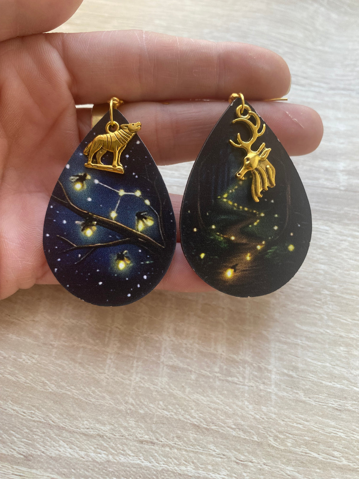 Boucles d’oreilles lucioles phosphorescentes animaux loup et cerf asymétriques