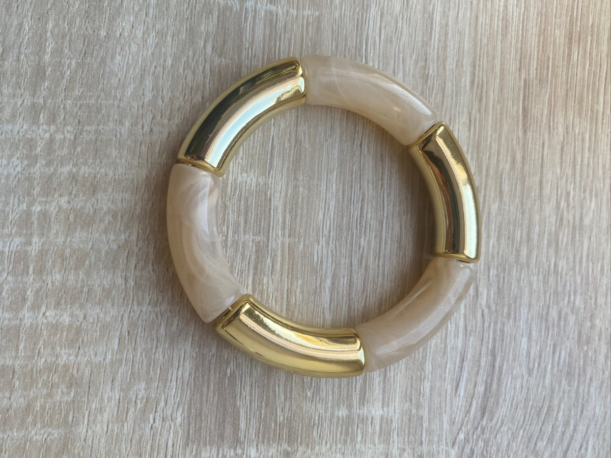 Bracelet élastique à grosse perle ivoire nacré et doré