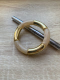 Bracelet élastique à grosse perle ivoire nacré et doré