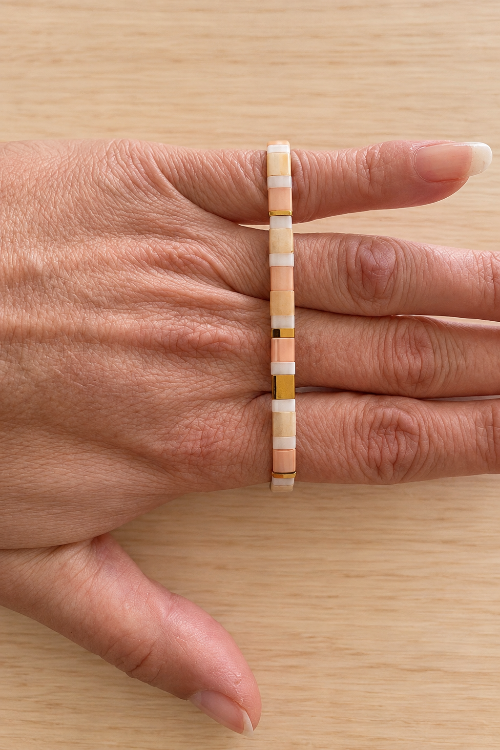 Bracelet fin élastique Half Tila dégradé pêche et abricot