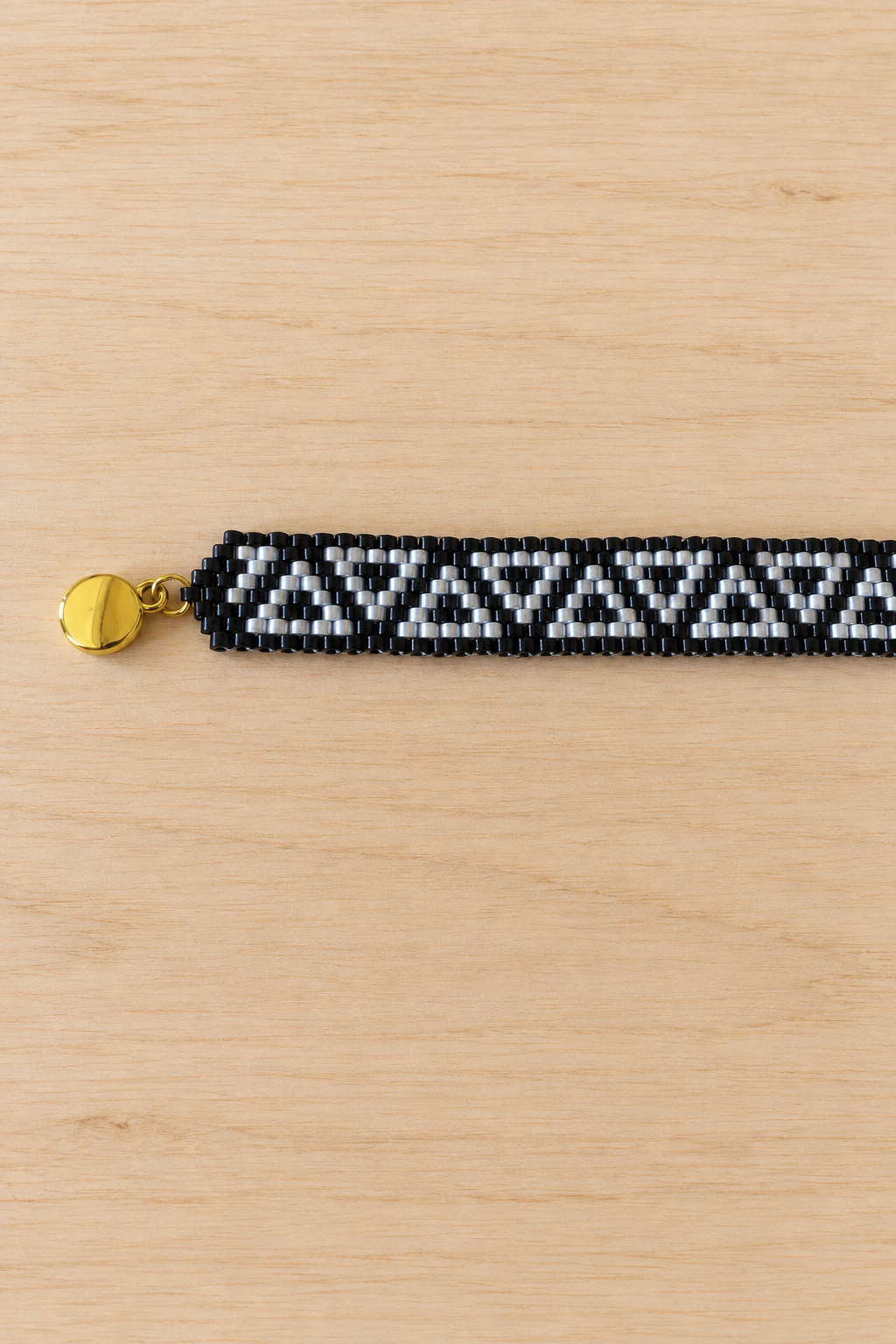 Bracelet Miyuki duo noir et blanc à triangles