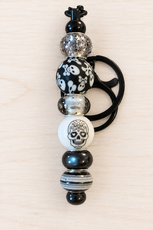 Bijou de sac tête de mort noire en perles – Halloween