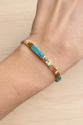 Bracelet fin élastique Half Tila turquoise marbré, ambre et doré