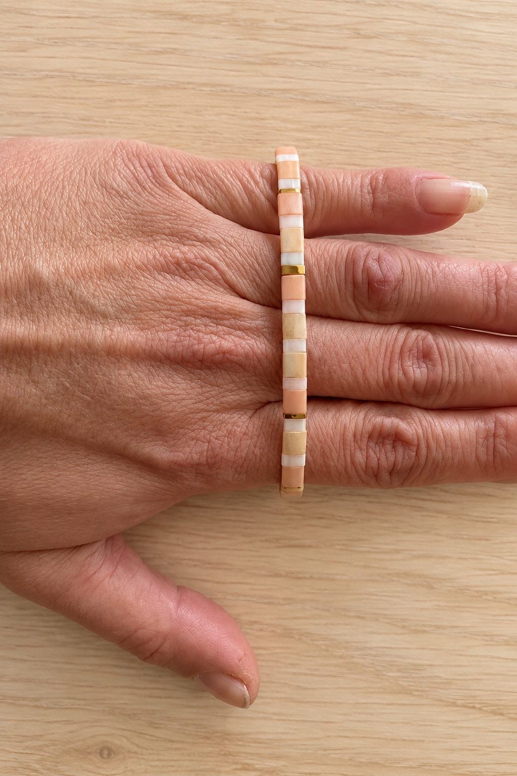 Bracelet fin élastique Half Tila dégradé pêche et abricot
