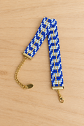 Bracelet Miyuki tissé blanc, bleu marine et doré ajustable