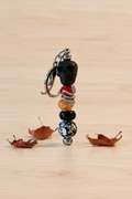 Bijou de sac crâne serpent noir en perles – Halloween