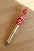 Stylo cola doré bois